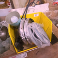 Lot 152 - Box Lot with Hubcaps and Accordion Lamp