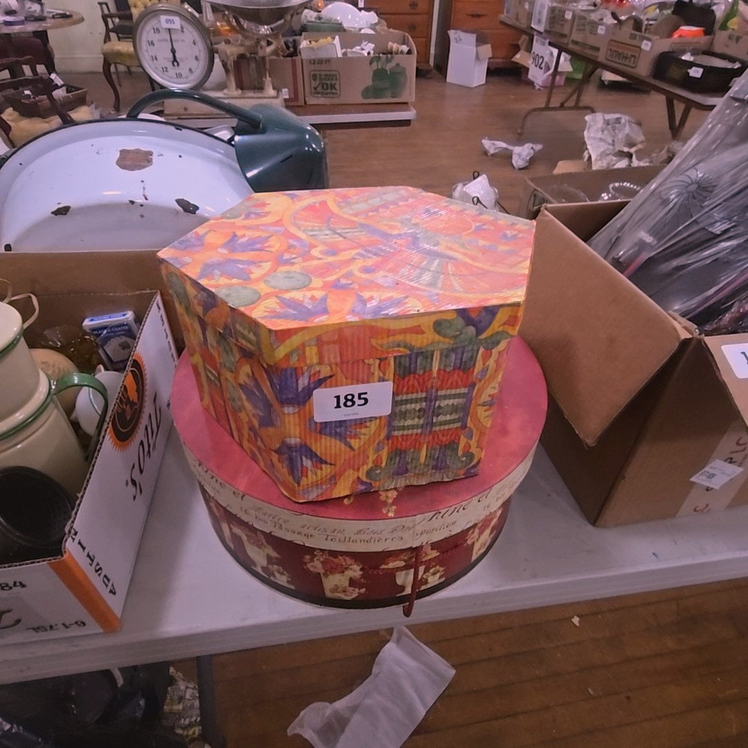 pair of hat boxes with contents