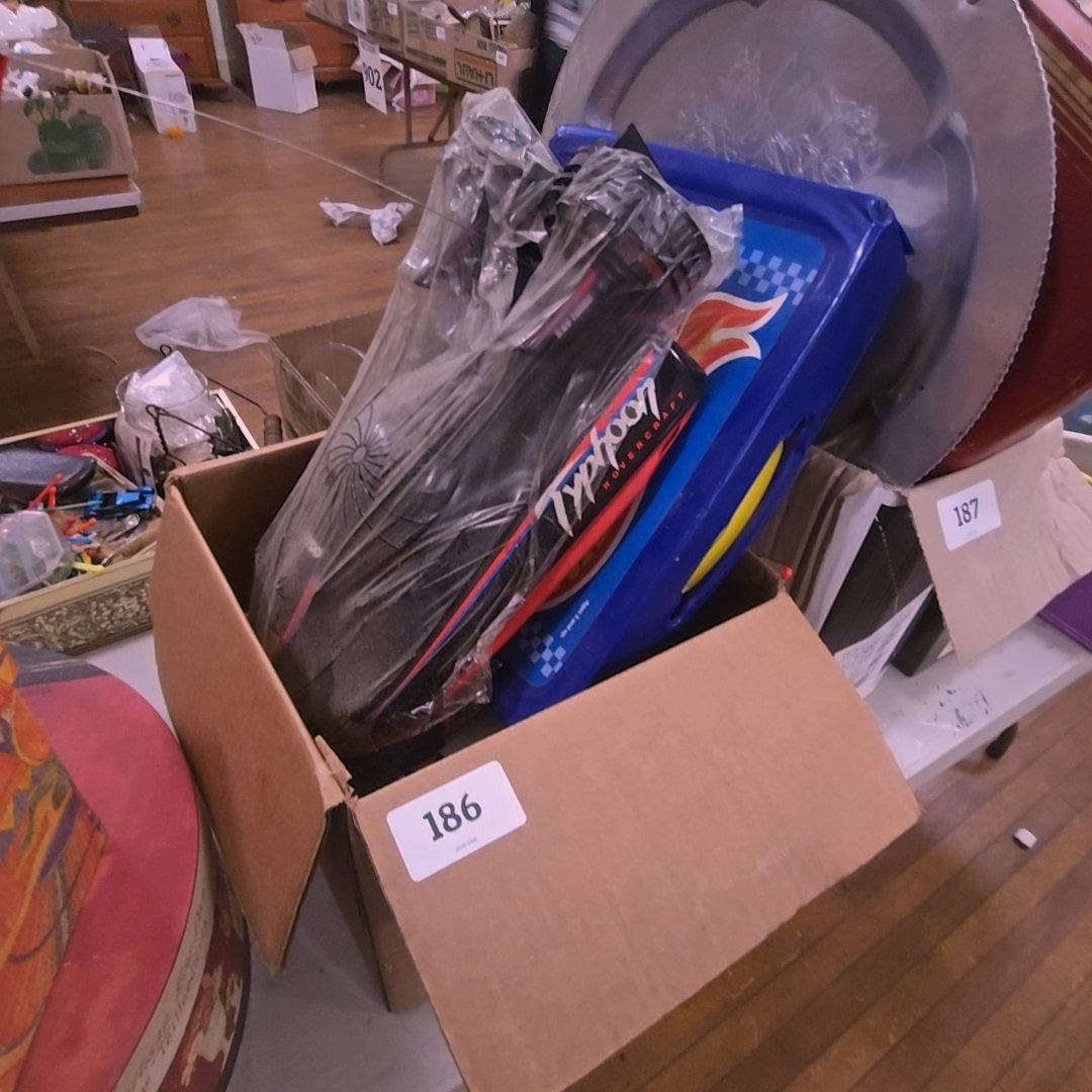 grouping of modern toys, including Hot Wheels case, case is empty
