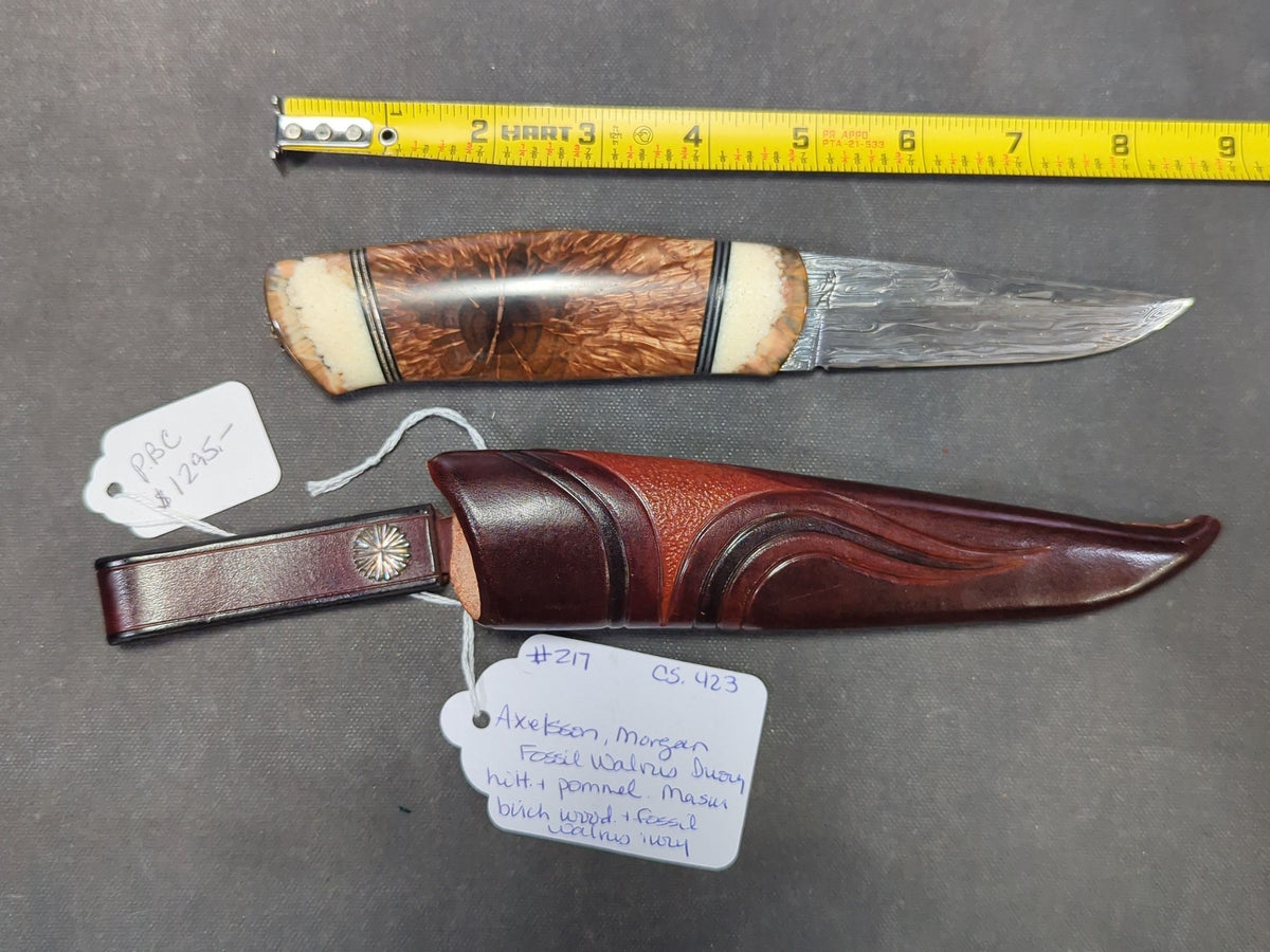 Axelsson Morgan Knife, Damascus Blade, Fossil Walrus Ivory and Masur Birch Handle, Sterling Silver Finial, with Tooled Leather Sheath