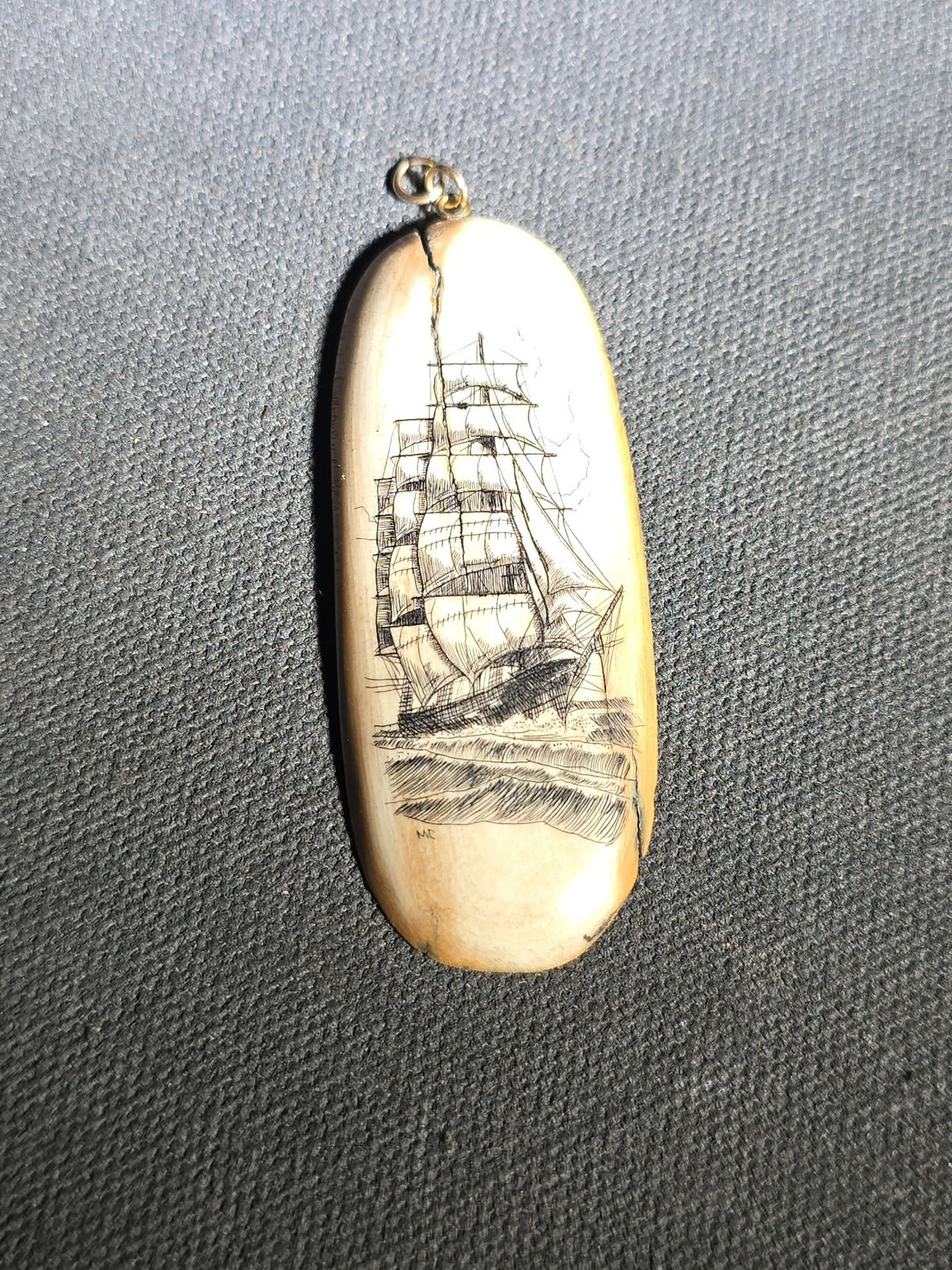 Scrimshaw Pendant Depicting a Full-Rigged Sailing Ship, Initialed "MC," with Metal Bail Loop