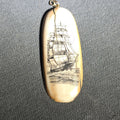 Lot 034 - Scrimshaw Pendant Depicting a Full-Rigged Sailing Ship, Initialed "MC," With Metal Bail Loop, 2-1/4" H