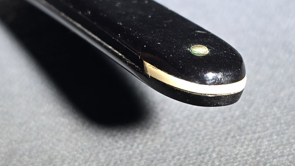 Antique Winchester Trade Mark Straight Razor with Black Scales and Brass Wedge
