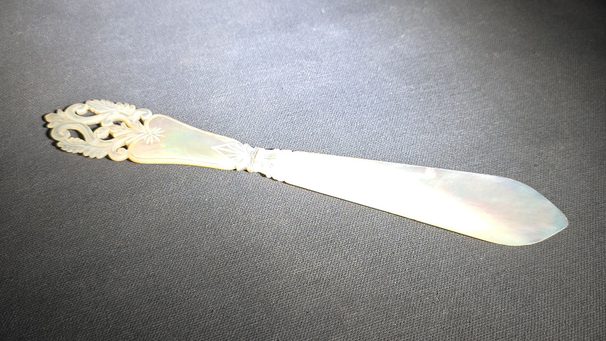 Antique Carved Mother of Pearl Letter Opener or Page Turner with Pierced Foliate Scroll Handle