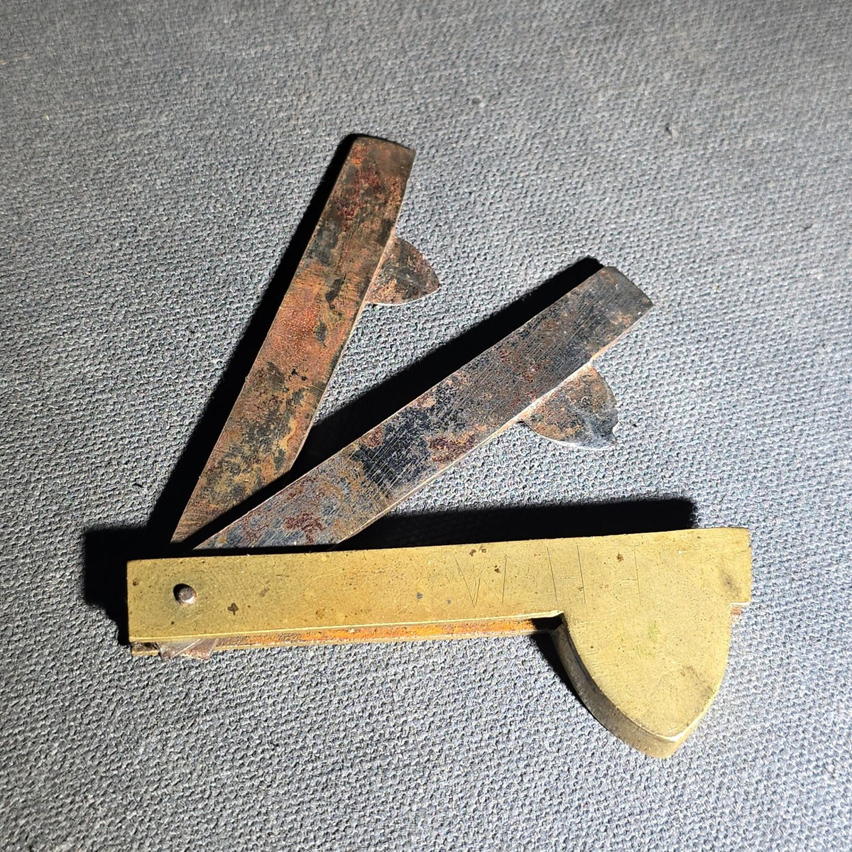 Antique Brass and Steel Folding Fleam with Two Blades, Engraved "P.H.M." on Handle