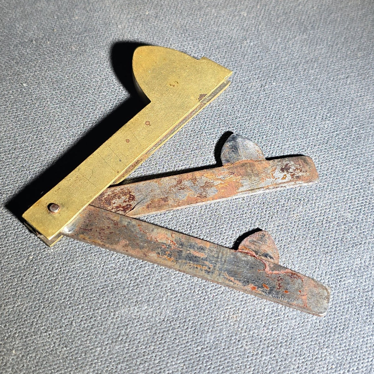 Antique Brass and Steel Folding Fleam with Two Blades, Engraved "P.H.M." on Handle
