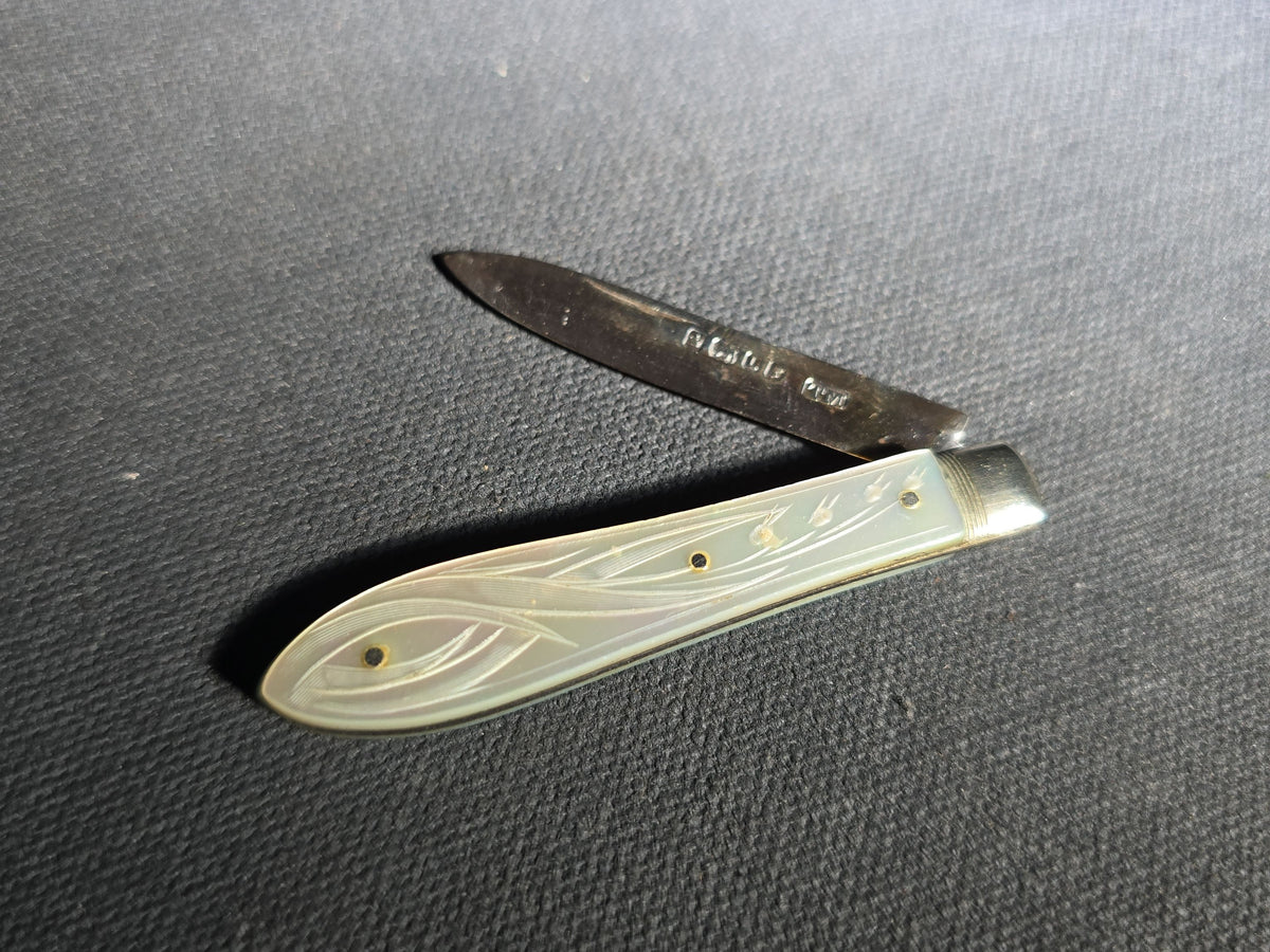 Antique Sterling Silver Folding Pocket Knife with Carved Mother-of-Pearl Handle Scales, Manufactured by Thomas Marples, Sheffield, England, 1878