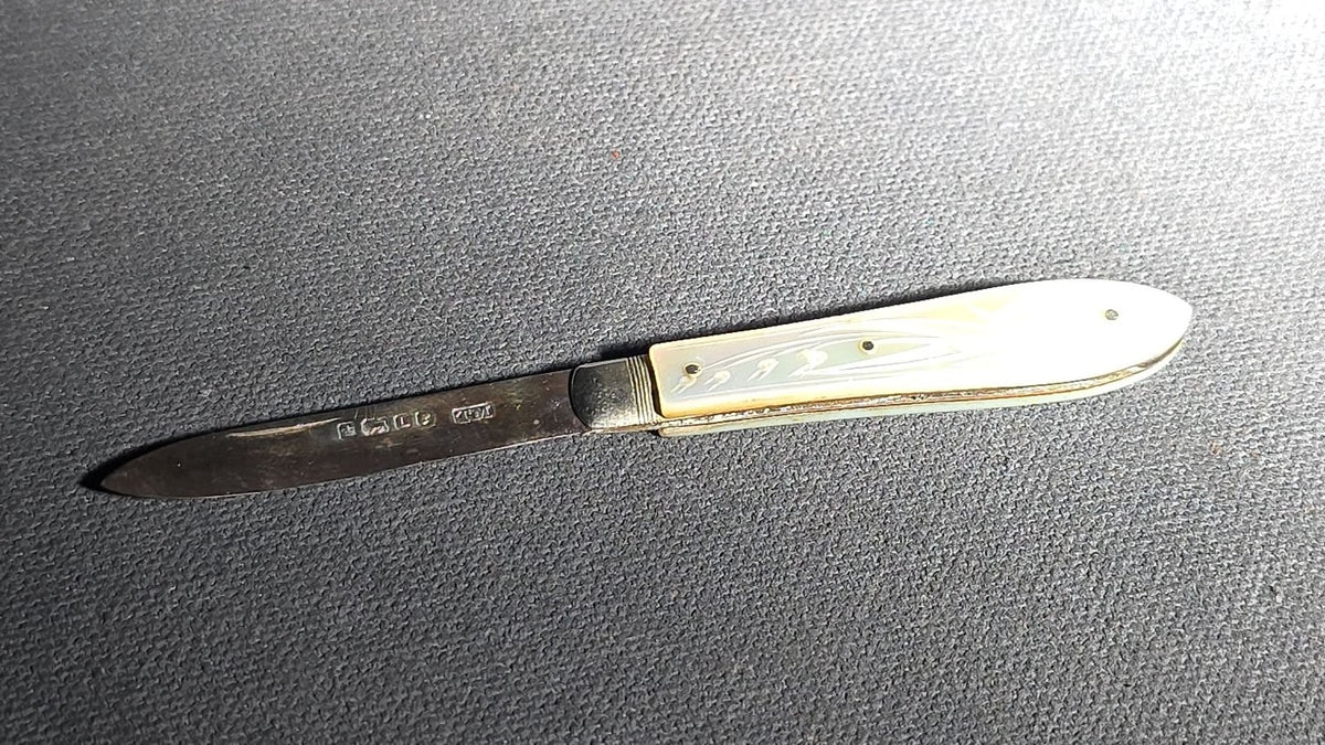 Antique Sterling Silver Folding Pocket Knife with Carved Mother-of-Pearl Handle Scales, Manufactured by Thomas Marples, Sheffield, England, 1878