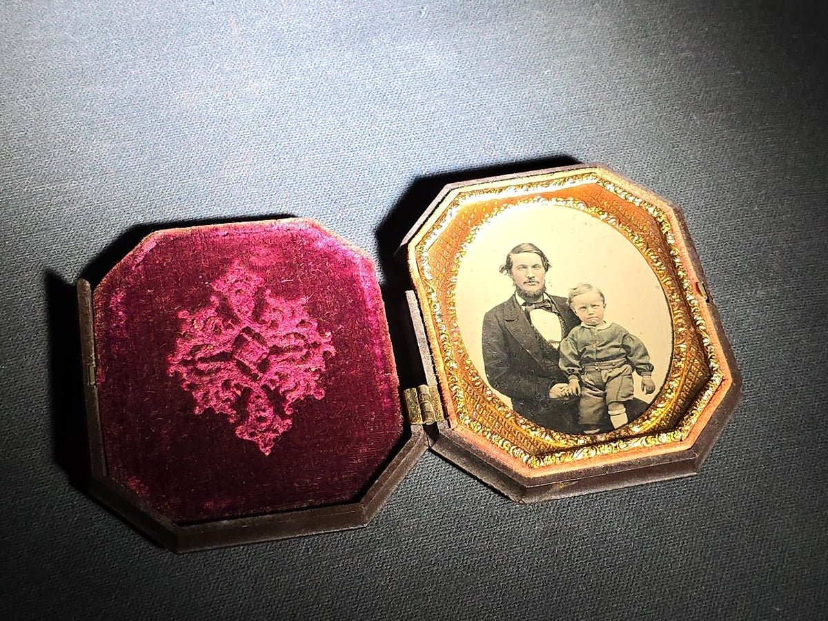 Antique 1/6th Plate Ambrotype Photograph of a Father and Young Son in Thermoplastic Union Case with Winged Cherub and Butterfly Chariot Design