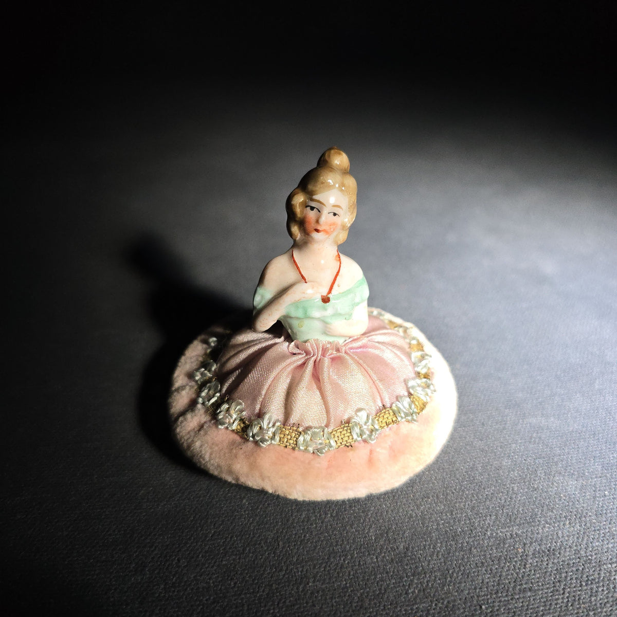 Antique German Porcelain Half-Doll Powder Puff with Pink Silk Skirt and Velvet Base, Marked Germany