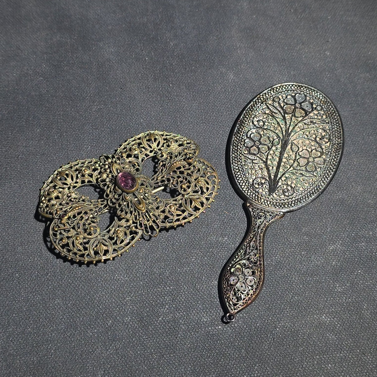 Pair of Antique Filigree Accessories including a Brooch with Purple Glass Cabochon and a Miniature Hand Mirror