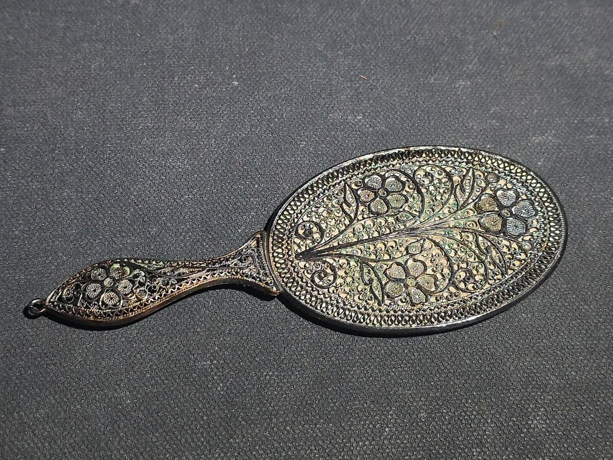 Pair of Antique Filigree Accessories including a Brooch with Purple Glass Cabochon and a Miniature Hand Mirror