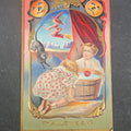 Lot 038 - Antique Embossed Halloween Postcard with Children Bobbing for Apples, Jack-O-Lanterns, Black Cat, and Witch on Broomstick, Halloween Series No. 5, Postmarked Providence, Rhode Island, 1910