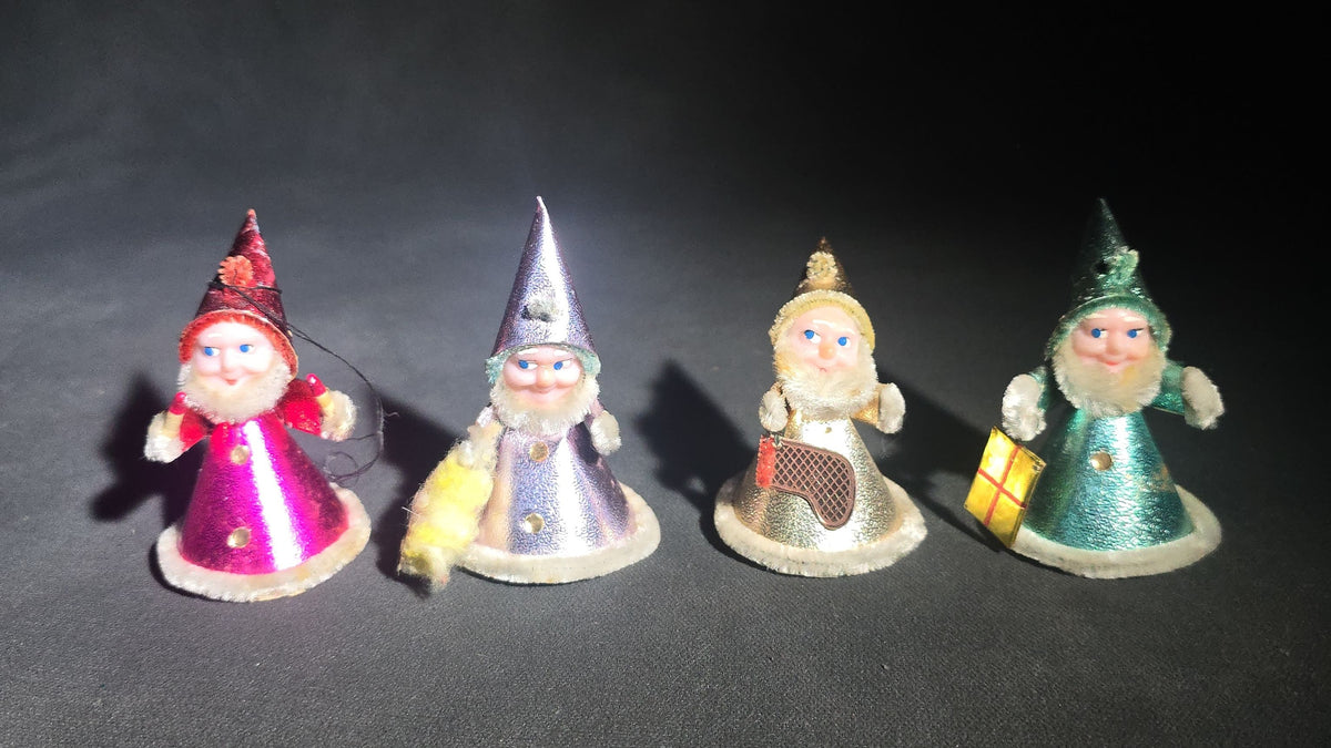 Grouping of Four Vintage Japanese Santa Claus Christmas Ornaments in Metallic Foil Cone Robes with Pipe Cleaner Arms