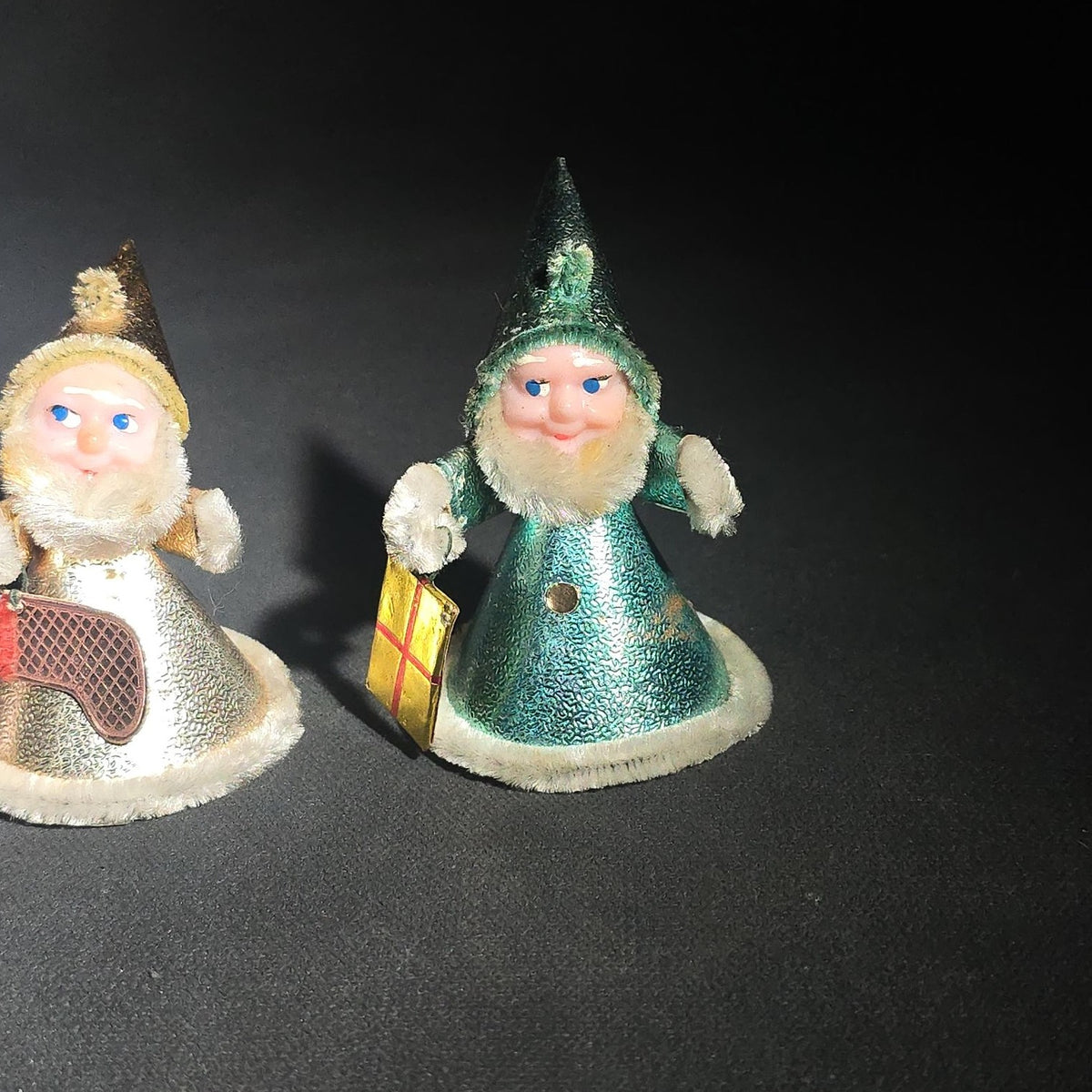 Grouping of Four Vintage Japanese Santa Claus Christmas Ornaments in Metallic Foil Cone Robes with Pipe Cleaner Arms
