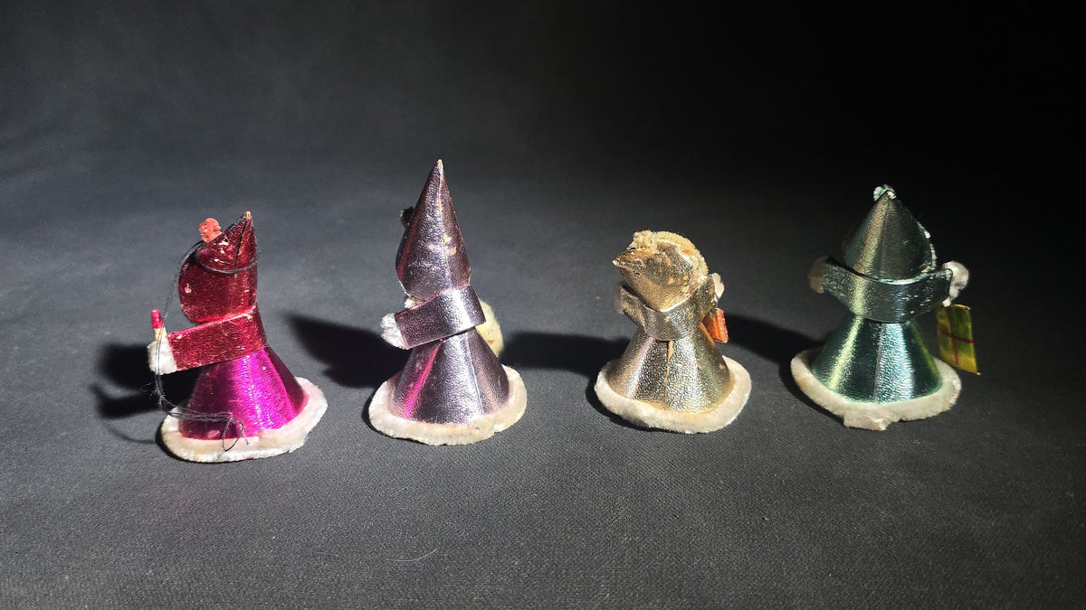 Grouping of Four Vintage Japanese Santa Claus Christmas Ornaments in Metallic Foil Cone Robes with Pipe Cleaner Arms