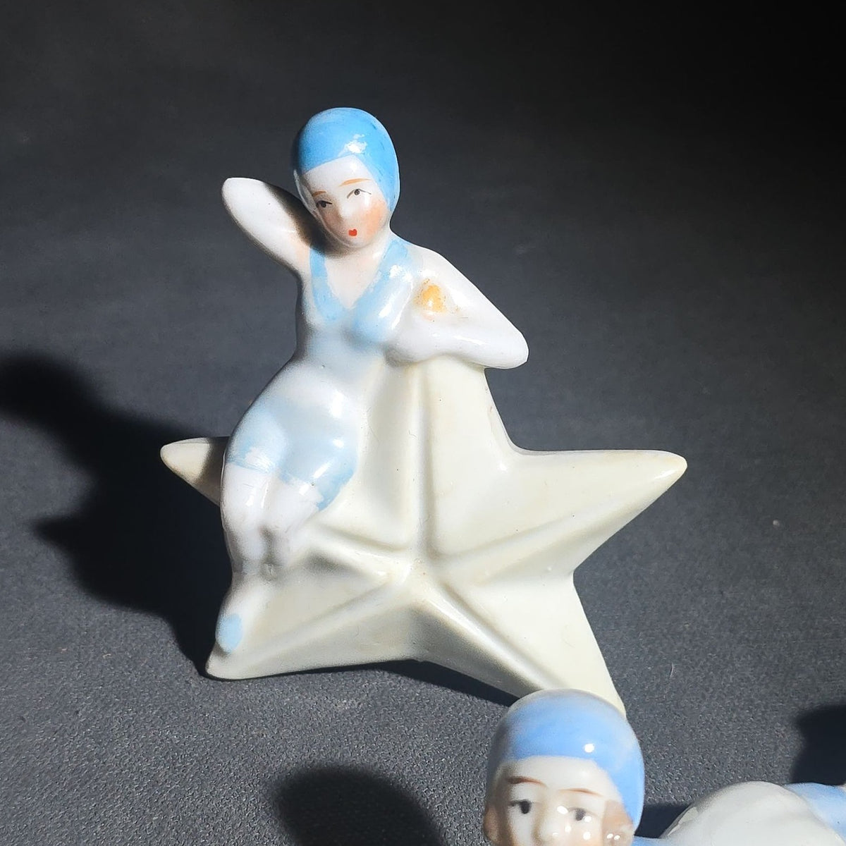 Grouping of Eight Vintage Porcelain Bathing Beauty and Nude Figurines including Reclining, Seated, and Standing Poses in Swimsuits and Nude Forms