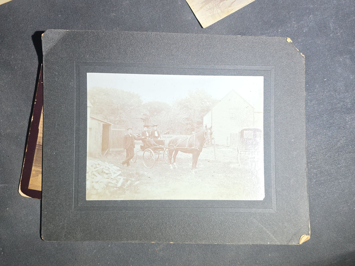 Grouping of Seven Antique Photographs including Board-Mounted Horse and Buggy, Oval-Cropped Barn, School Class with Names Inscribed, Large Victorian Building, "The Ormsbee House," Two Children with Birdcage, and Winter Hilltop View
