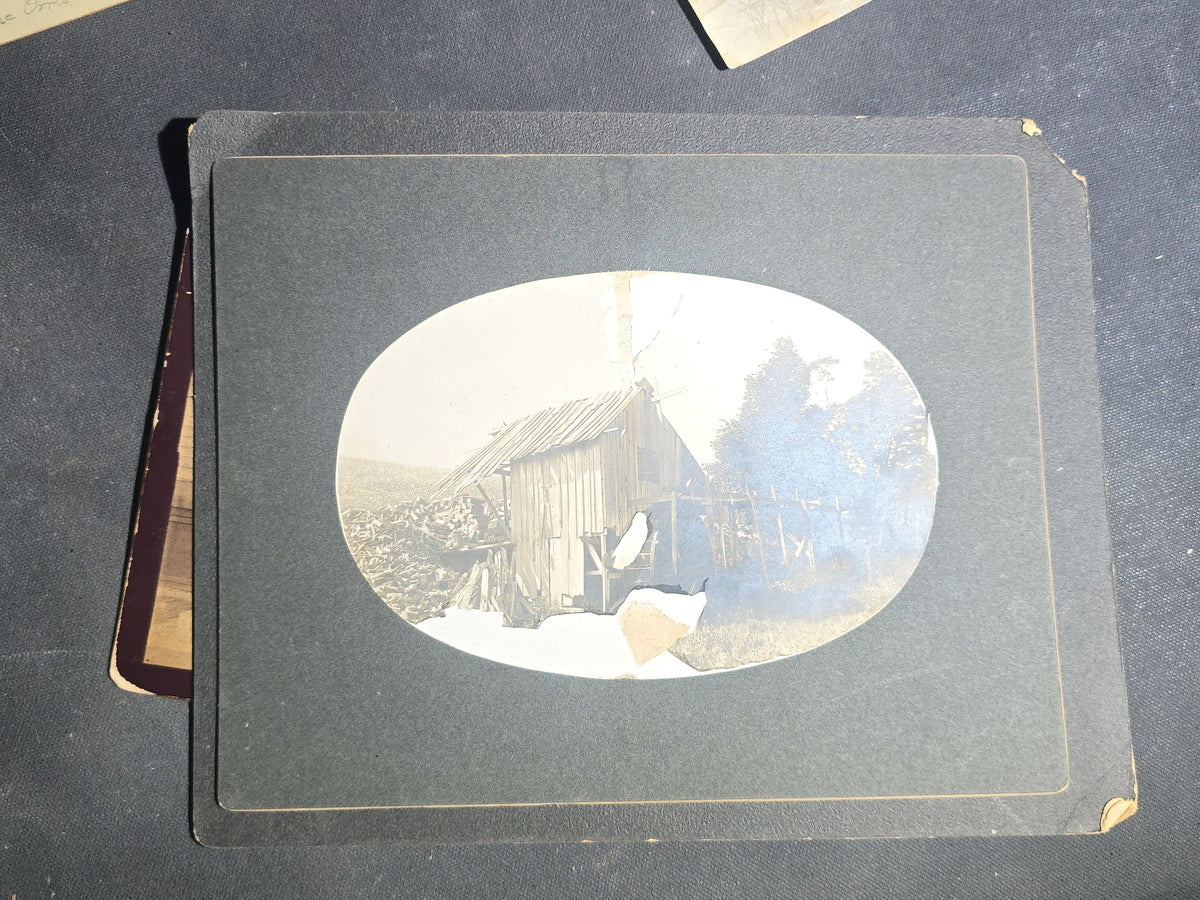 Grouping of Seven Antique Photographs including Board-Mounted Horse and Buggy, Oval-Cropped Barn, School Class with Names Inscribed, Large Victorian Building, "The Ormsbee House," Two Children with Birdcage, and Winter Hilltop View