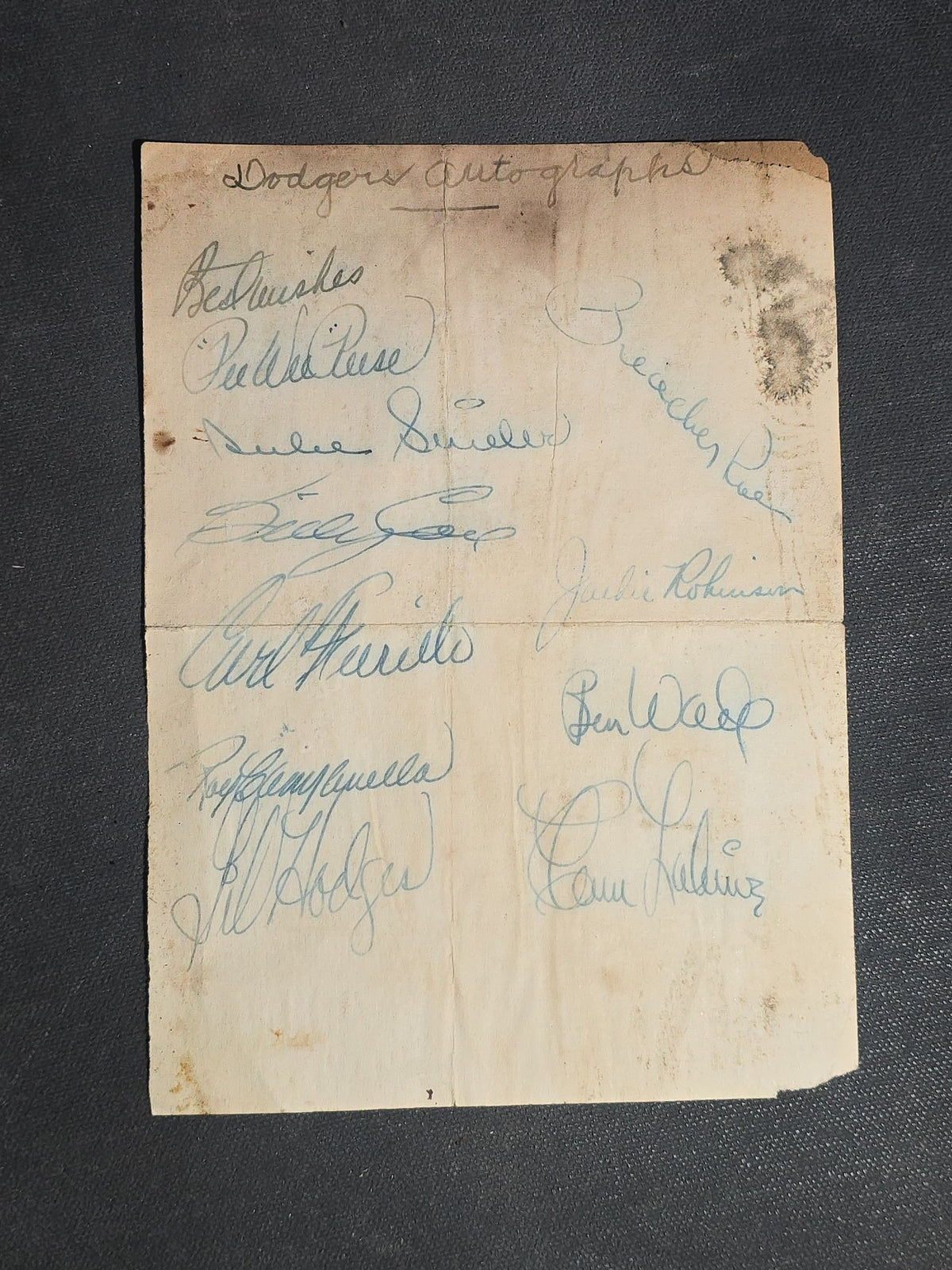 Vintage Paper Sheet with Purported 1952 Brooklyn Dodgers Autographs including Jackie Robinson, Pee Wee Reese, Duke Snider, Roy Campanella, Gil Hodges, Carl Furillo, Preacher Roe, Billy Cox, Ben Wade, and Clem Labine