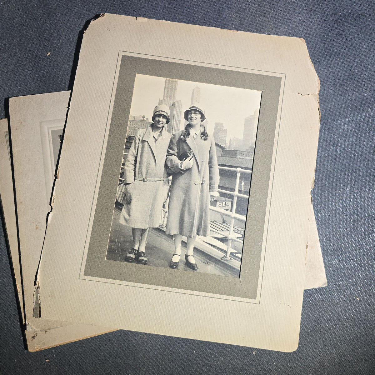 Grouping of Seven Antique and Vintage Board-Mounted and Foldered Photographs including Community Gatherings, Family Portraits, City Hall Group, and Conway "12" Inscription