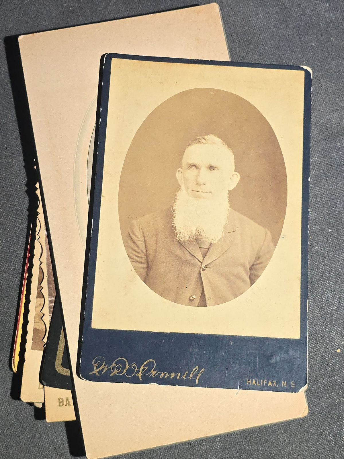Grouping of 22 Antique Cabinet Card Photographs including Military Portraits, Clergy, Memorial Card, and Architectural Views, Photographed by Bayley & Murphy, Halifax, Nova Scotia and Others