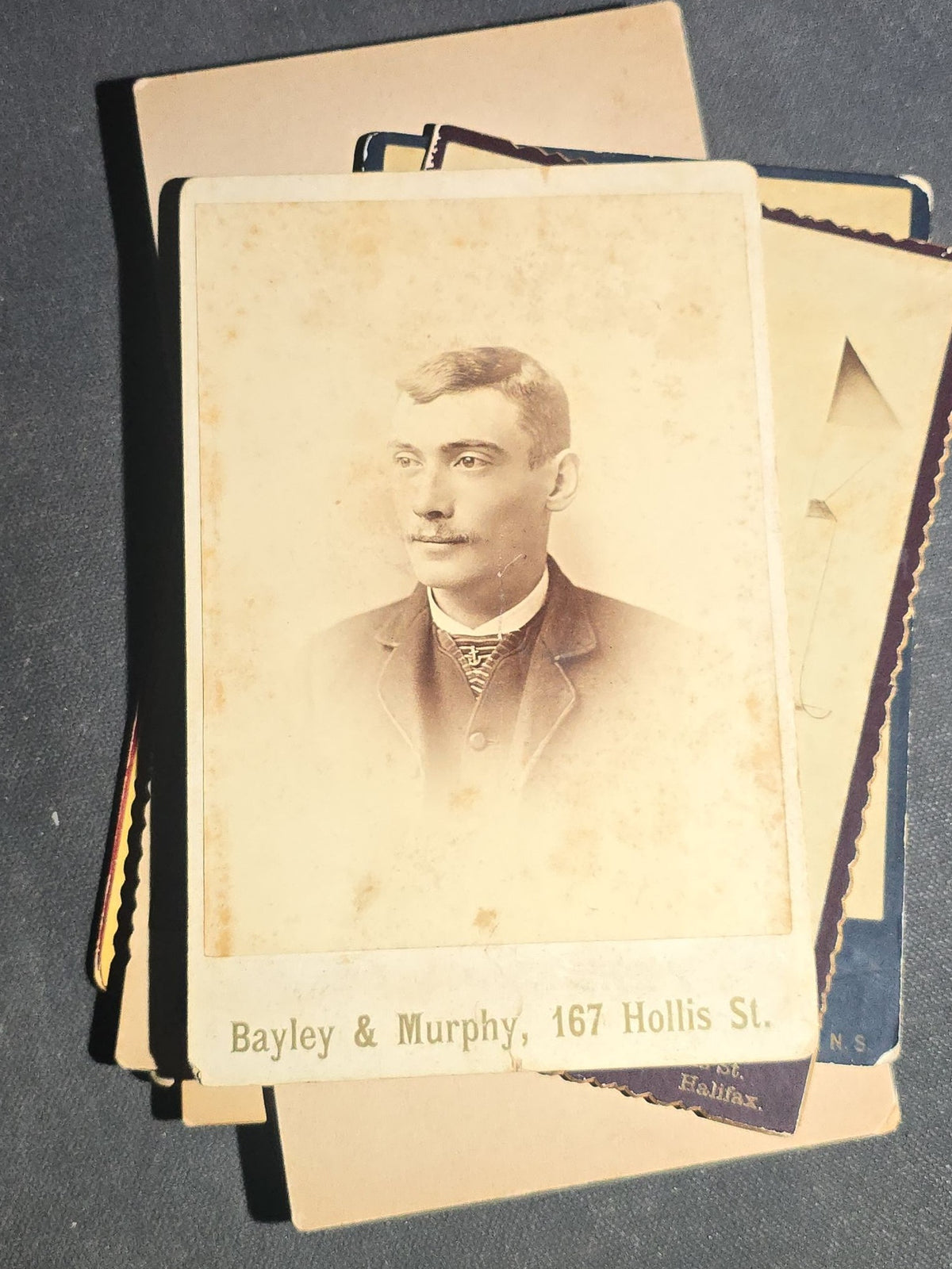 Grouping of 22 Antique Cabinet Card Photographs including Military Portraits, Clergy, Memorial Card, and Architectural Views, Photographed by Bayley & Murphy, Halifax, Nova Scotia and Others
