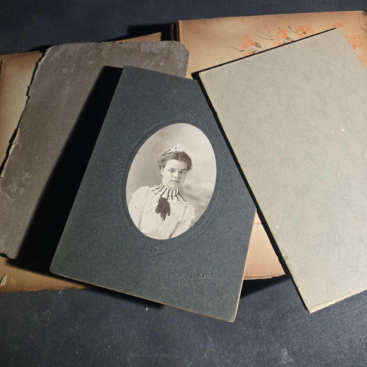 Antique Victorian Celluloid Cover Photo Album with Woman Holding Fan on Cover, Containing Cabinet Card Photographs, C.D.V.s, and Snapshot Photographs