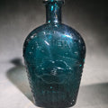 Lot 123 - Vintage Teal Green Glass "Union" Clasped Hands and Shield Reproduction Historical Flask with Stars, 8-1/2" H