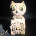 Lot 136 - Vintage Pink Kit Cat Klock Model D8 Electric Wall Clock with Rhinestone Accents, Manufactured by California Clock Co., San Juan Capistrano, California, 8-3/4" H