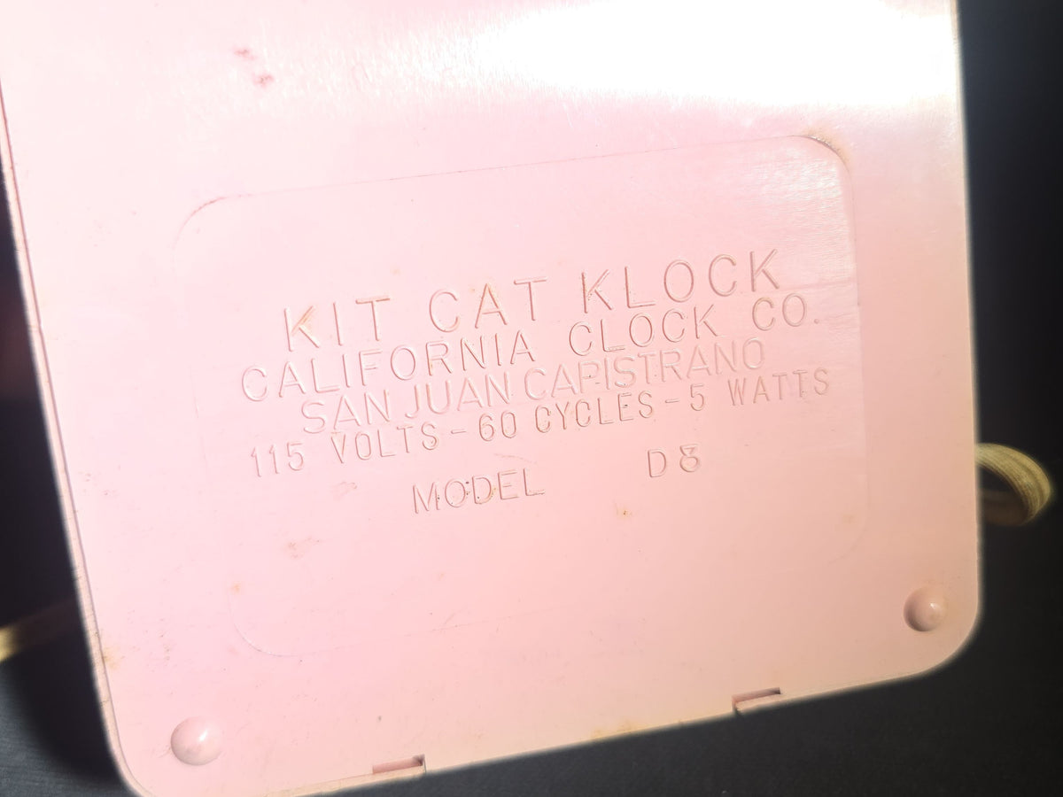 Vintage Pink Kit Cat Klock Model D8 Electric Wall Clock with Rhinestone Accents, Manufactured by California Clock Co., San Juan Capistrano, California