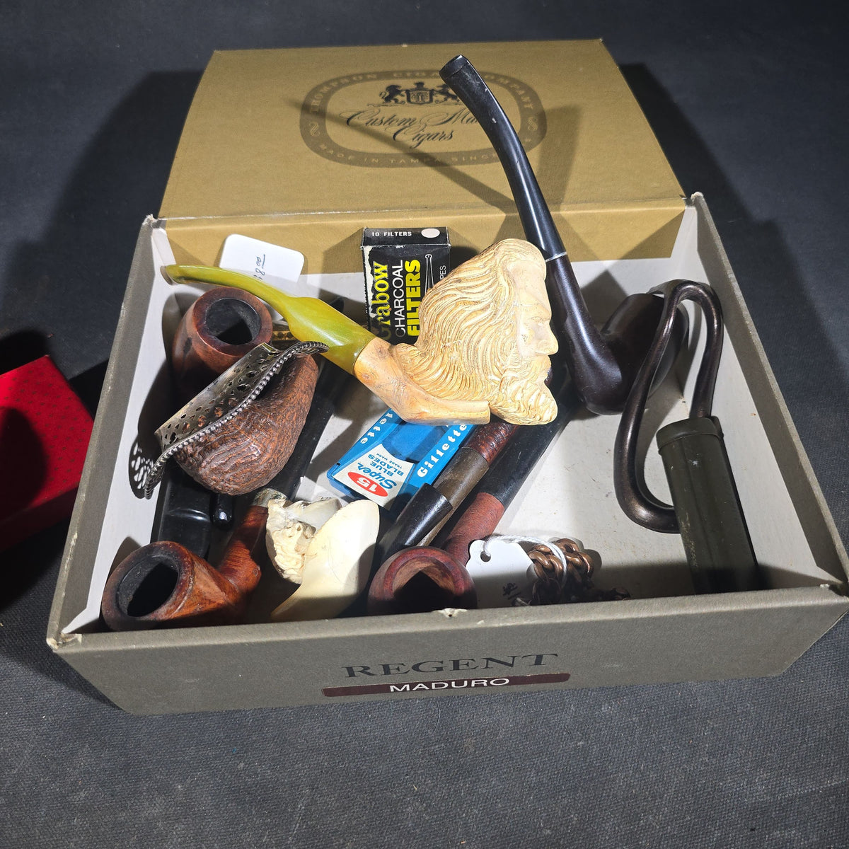Grouping of Antique and Vintage Smalls including Meerschaum and Briar Smoking Pipes, Sterling Silver Reticulated Tray, Solid Copper Cuban Link Bracelet, and Scrimshaw-Style Carved Horn Pieces