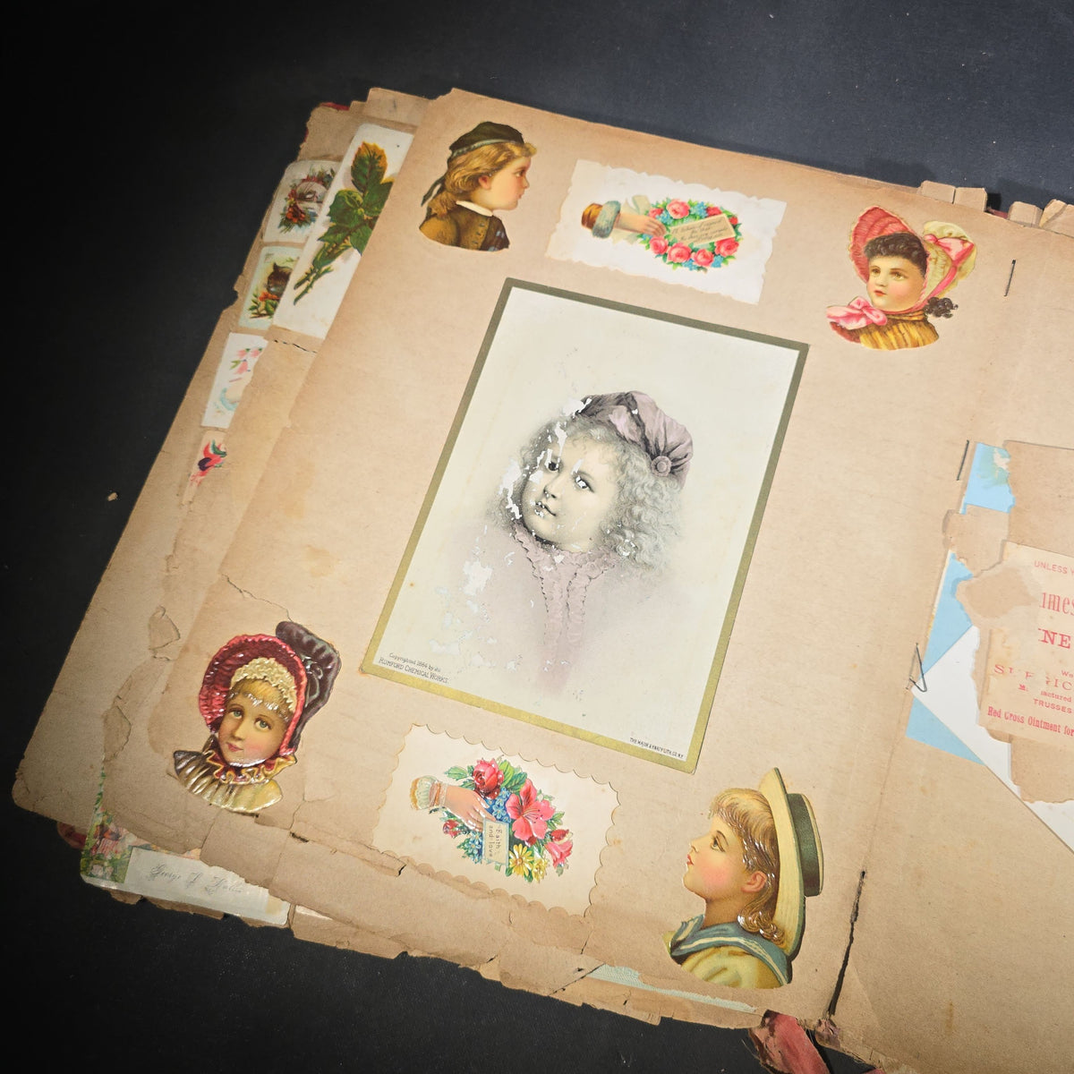 Antique Victorian "Scraps" Scrapbook Album with Over 100 Chromolithograph Trade Cards, Die Cuts, Greeting Cards, and Prints including Hires Root Beer, Great Atlantic & Pacific Tea Co., and Raphael Tuck & Sons