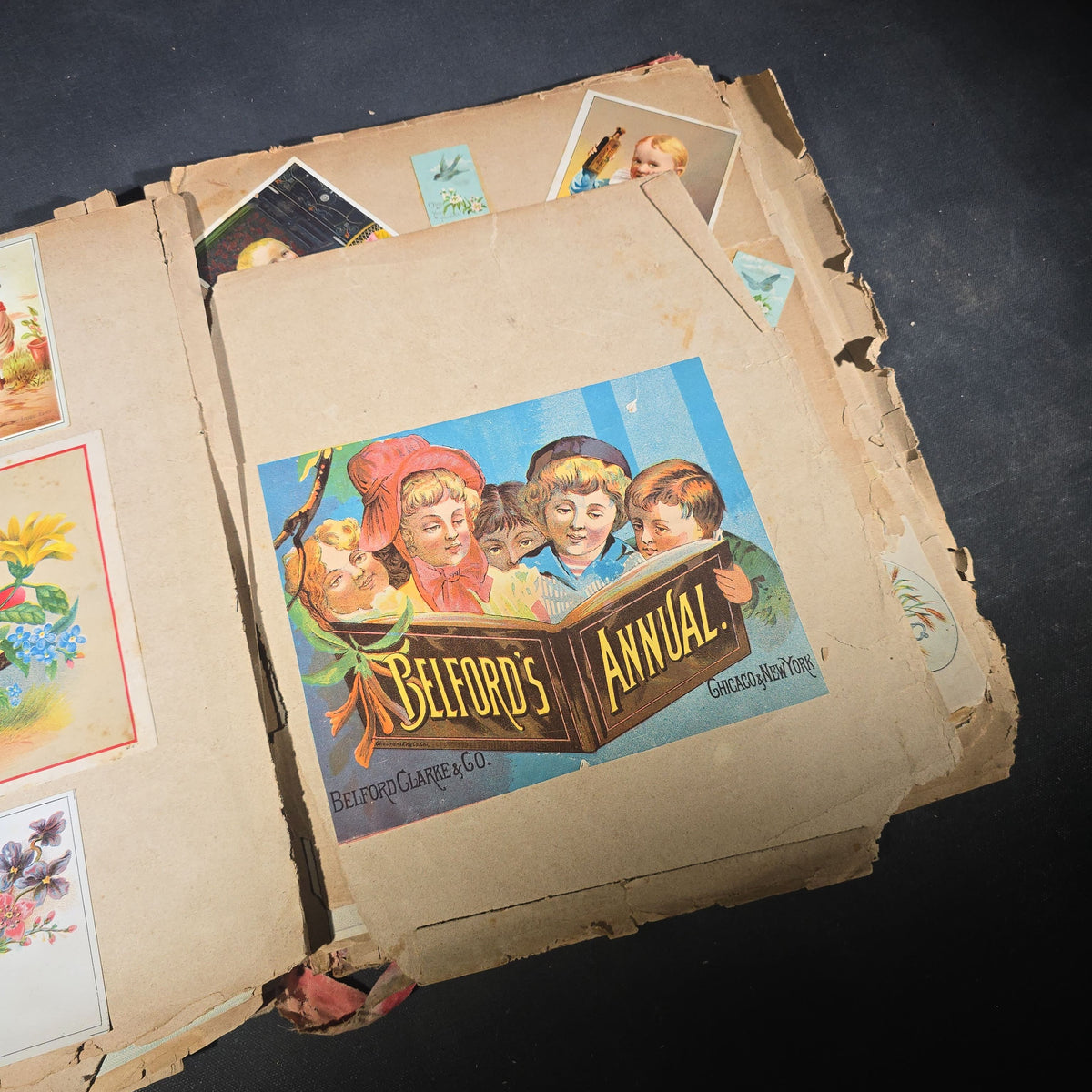 Antique Victorian "Scraps" Scrapbook Album with Over 100 Chromolithograph Trade Cards, Die Cuts, Greeting Cards, and Prints including Hires Root Beer, Great Atlantic & Pacific Tea Co., and Raphael Tuck & Sons