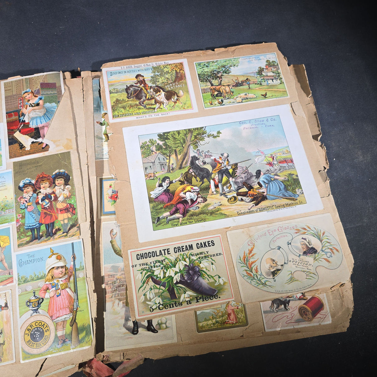 Antique Victorian "Scraps" Scrapbook Album with Over 100 Chromolithograph Trade Cards, Die Cuts, Greeting Cards, and Prints including Hires Root Beer, Great Atlantic & Pacific Tea Co., and Raphael Tuck & Sons