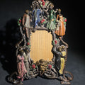 Lot 137 - Antique Cold-Painted Cast Iron Figural Easel-Back Picture Frame with Courting Couples, Cherub, and Roses, British Rd. No. 576364, 11" L x 14-1/2" H