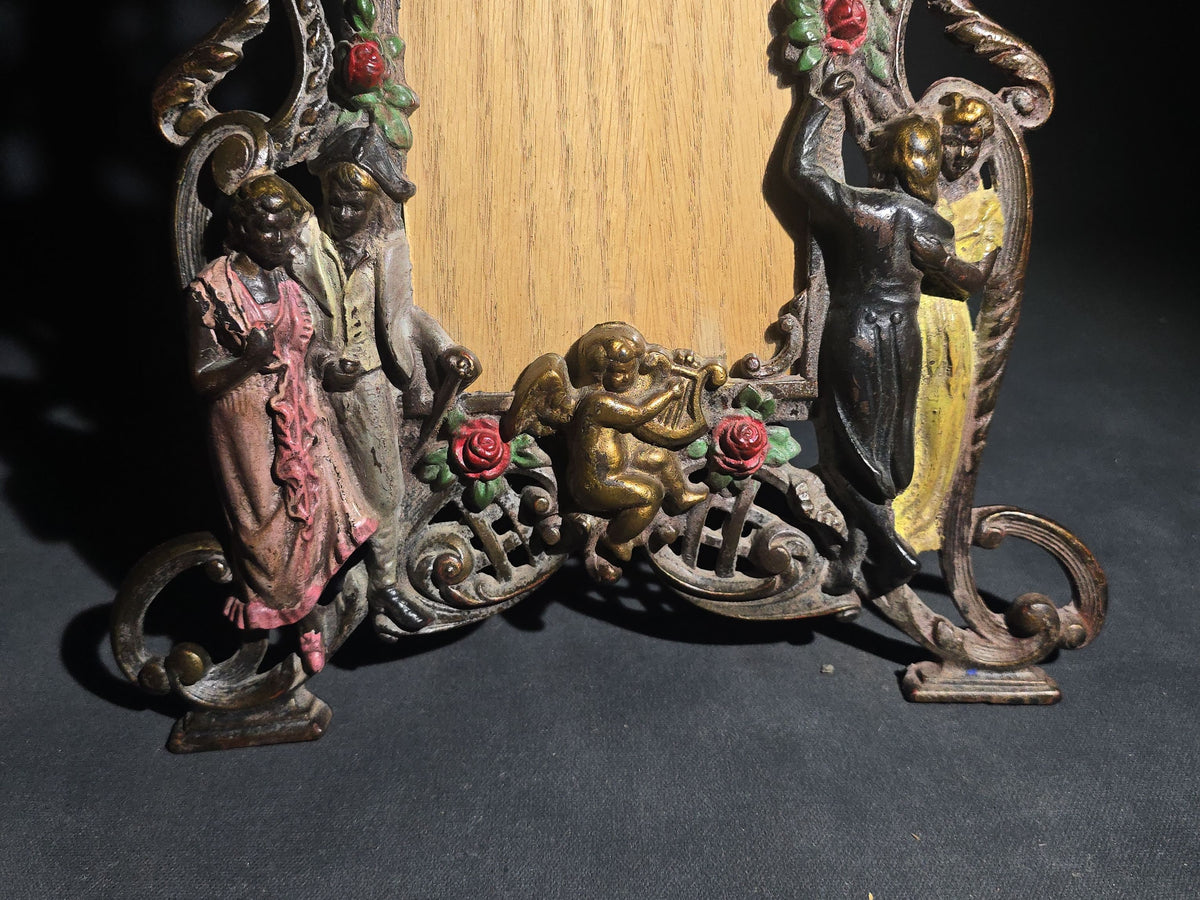 Antique Cold-Painted Cast Iron Figural Easel-Back Picture Frame with Courting Couples, Cherub, and Roses, British Rd. No. 576364