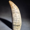 Lot 035 - Modern Faux Scrimshaw Resin Whale Tooth, "The Ship Roman" With Full-Rigged Ship and Sailor Holding American Flag, 6-1/4" H