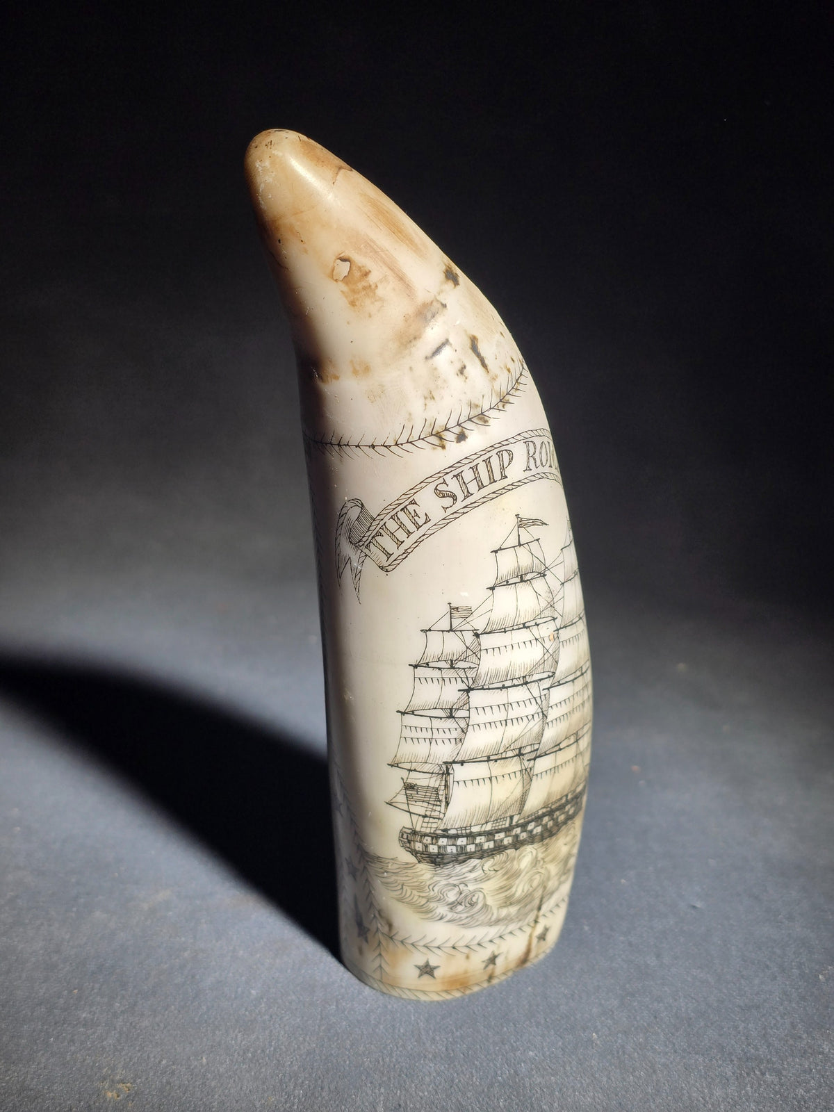 Modern Faux Scrimshaw Resin Whale Tooth, "The Ship Roman" with Full-Rigged Ship and Sailor Holding American Flag