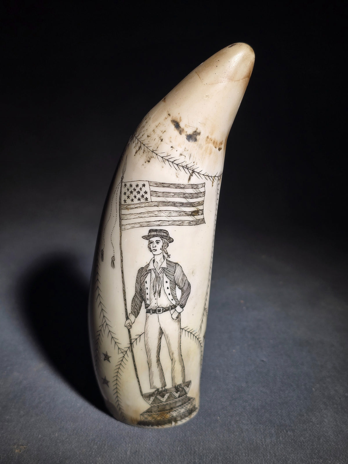 Modern Faux Scrimshaw Resin Whale Tooth, "The Ship Roman" with Full-Rigged Ship and Sailor Holding American Flag