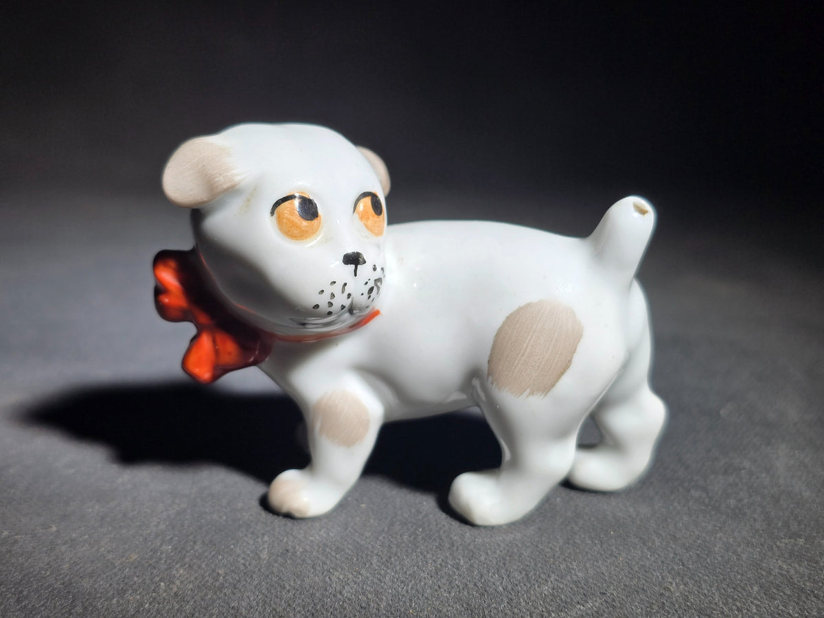 Vintage German Porcelain Puppy Dog Figurine with Red Bow Collar, Manufactured by Pfeffer Porzellan, Gotha, Germany