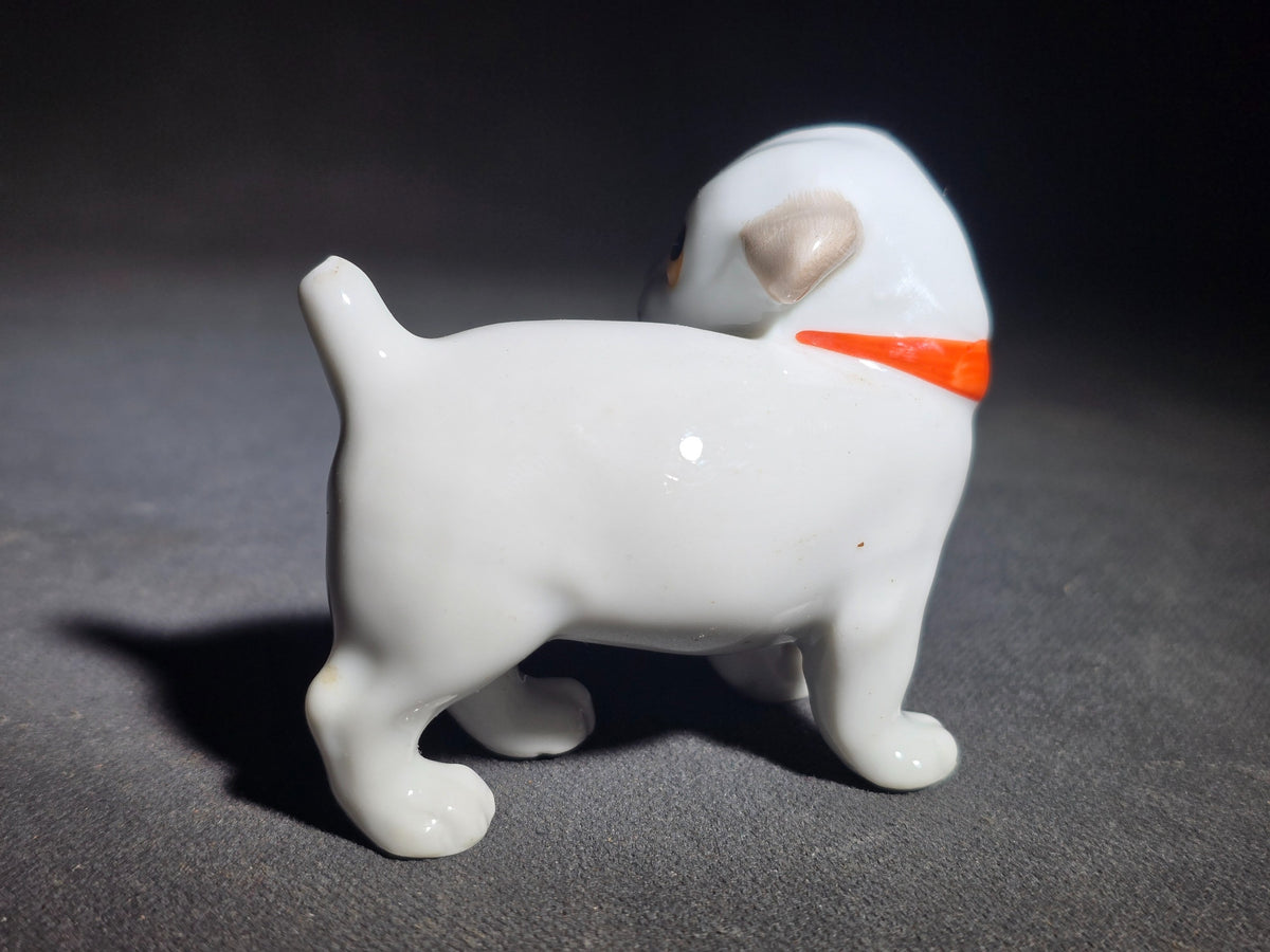 Vintage German Porcelain Puppy Dog Figurine with Red Bow Collar, Manufactured by Pfeffer Porzellan, Gotha, Germany