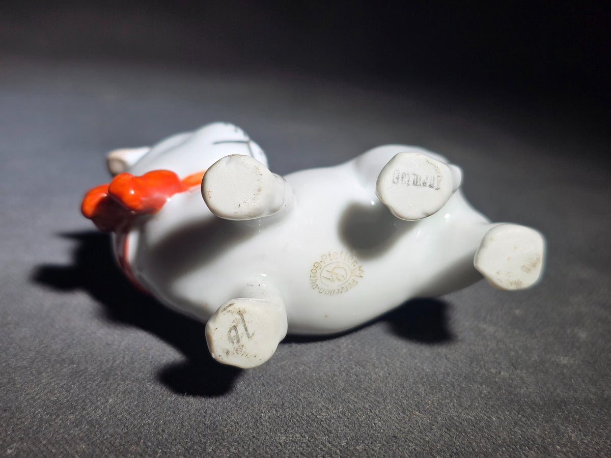 Vintage German Porcelain Puppy Dog Figurine with Red Bow Collar, Manufactured by Pfeffer Porzellan, Gotha, Germany