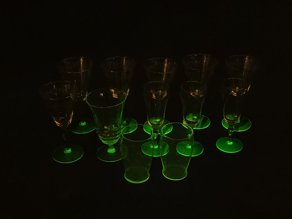 Grouping of 12 Antique Uranium Glass Drinking Vessels with Etched Stemware and Tumblers