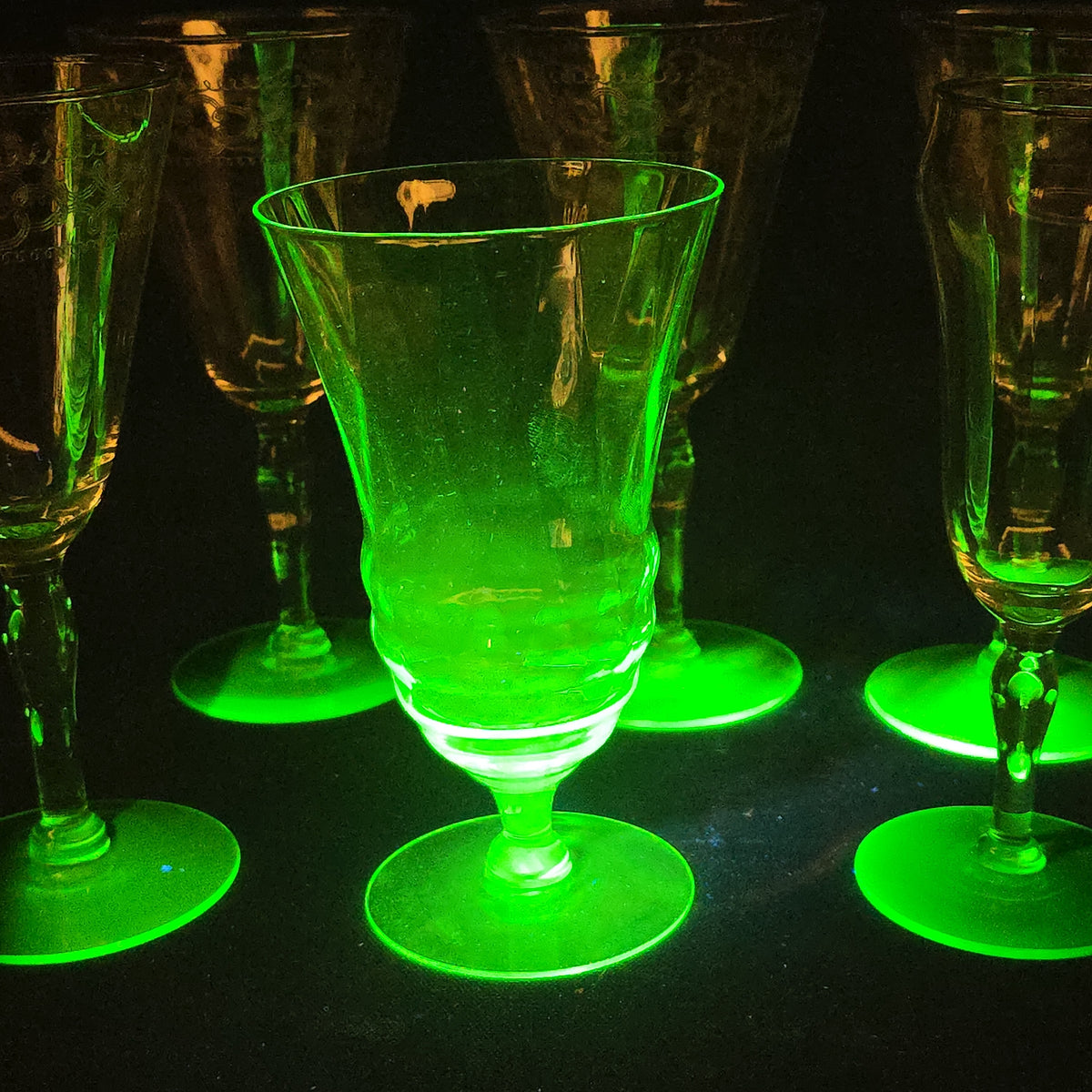 Grouping of 12 Antique Uranium Glass Drinking Vessels with Etched Stemware and Tumblers