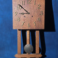 Lot 097 - Antique Arts and Crafts Oak Wall Clock with Pendulum and Brass Numerals, 12-3/4" L x 27-1/4" H