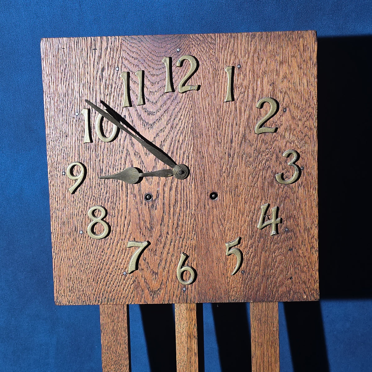 Antique Arts and Crafts Oak Wall Clock with Pendulum and Brass Numerals