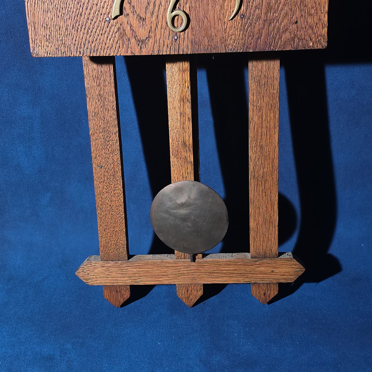 Antique Arts and Crafts Oak Wall Clock with Pendulum and Brass Numerals