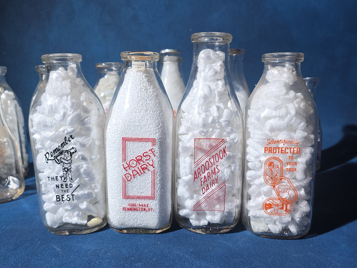 Grouping of 13 Vintage Printed Glass Dairy Milk Bottles including Capitol Dairy, Horst Dairy, Aroostook Farms, Sanford Dairy, Rice's, Findeisen's Farms, and Others