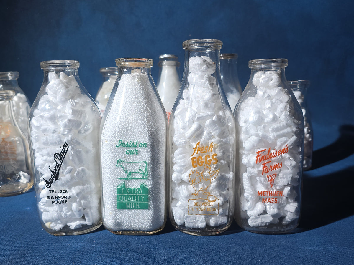 Grouping of 13 Vintage Printed Glass Dairy Milk Bottles including Capitol Dairy, Horst Dairy, Aroostook Farms, Sanford Dairy, Rice's, Findeisen's Farms, and Others